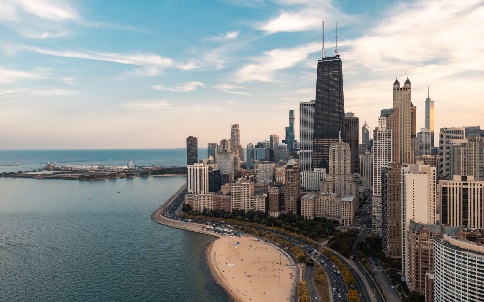 Stunning aerial view of Chicago skyline and beachfront along Lake Michigan.